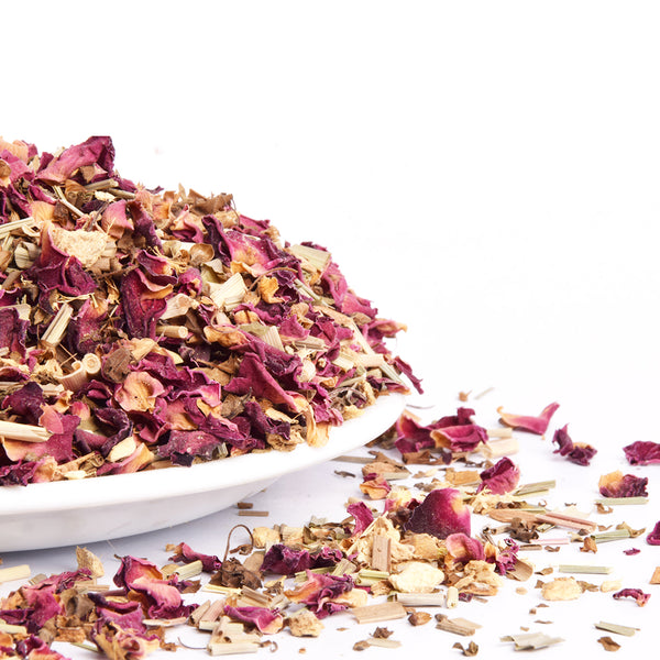Femap detox tea herbal loose tea with dehydrated flower and herbs showing close view.
