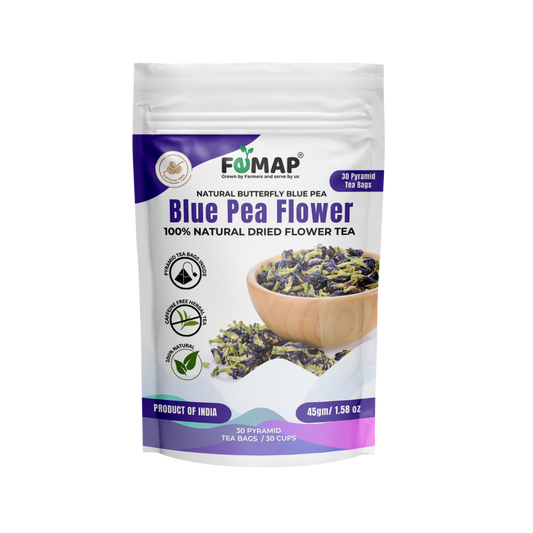 Packaging of FEMAP Butterfly Pea Flower Tea Bags displaying the product name, image of the tea bags, and a bowl of steeped tea. The package highlights that the tea is 100% natural and has a product of India origin.
