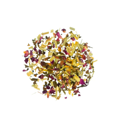 Close‑up of ingredients in FEMAP detox tea – lemongrass, rose petals, ginger, cinnamon and other herbs