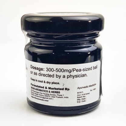 A black jar of shilajit resin 30g dosage mentioned back of sticker