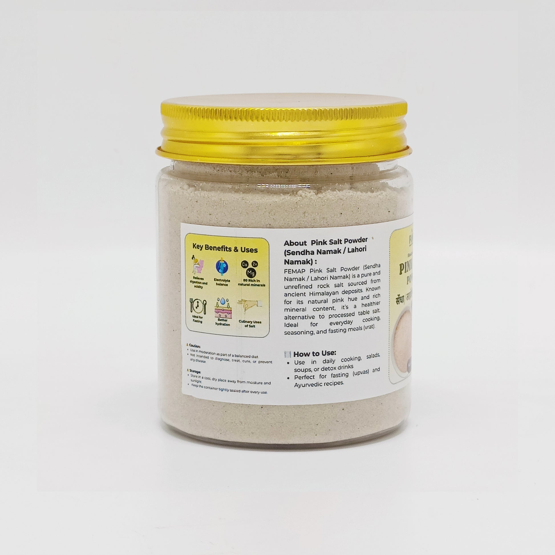 Jar of pink salt powder with a yellow lid on a white background